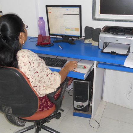 Operator monitoring a print production dashboard